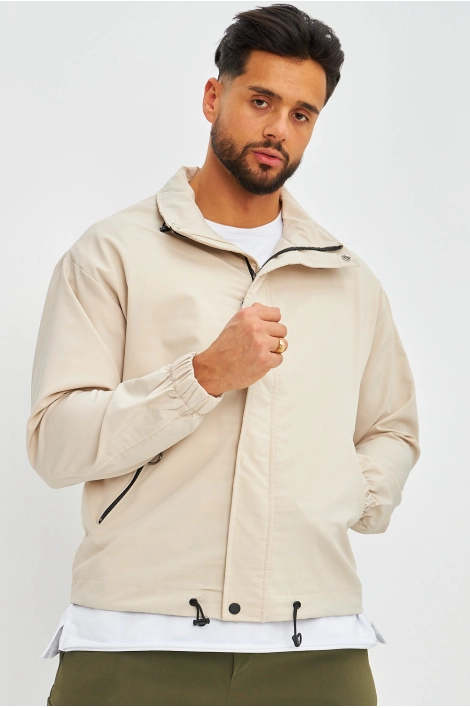 Veste beige col montant