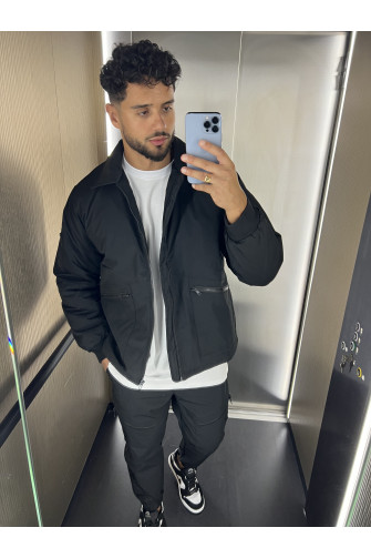 Blouson noir à poches zippées
