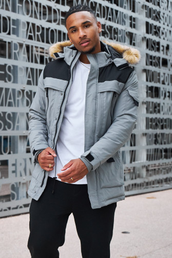 Parka bi-matière grise à capuche en fourrure