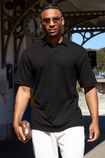 Polo noir ajouré à motif