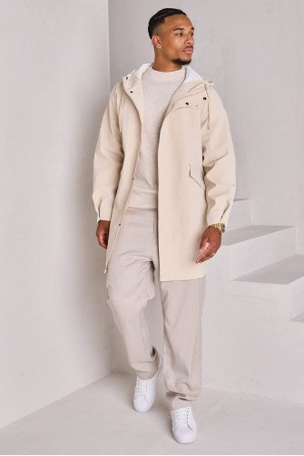 Veste de pluie beige texturée
