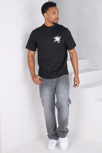 Loose-fitting black tee with flower logo