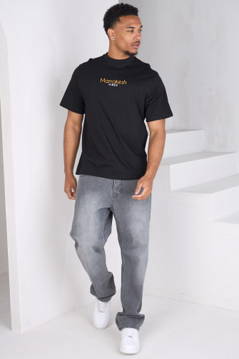 Loose-fitting black T-shirt with Marrakesh logo