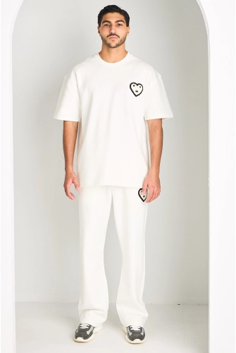 Ensemble blanc haut + pantalon avec broderies