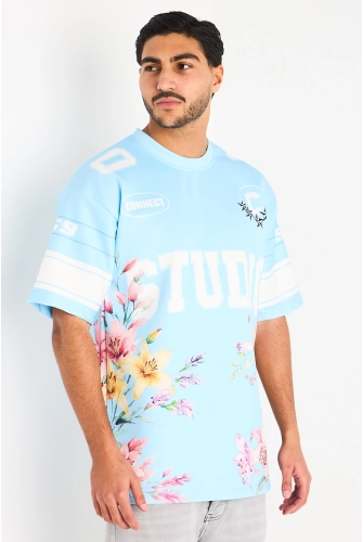 Tee-shirt bleu clair à motifs floraux et inscriptions