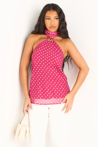 Haut rose à col ras-de-cou et motifs à pois