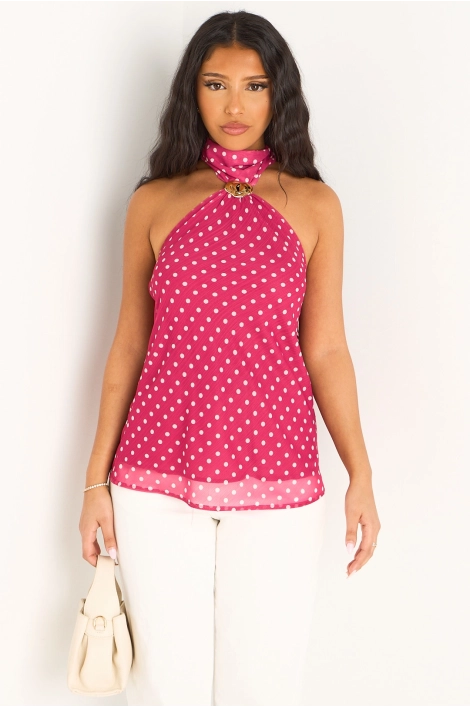 Haut rose à col ras-de-cou et motifs à pois