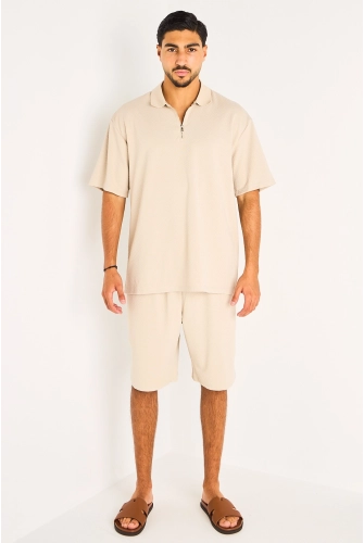 Ensemble deux pièces beige haut + short à motifs chevrons