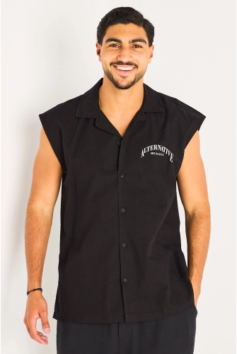 Chemise noire sans manches à inscriptions et empiècement étoile