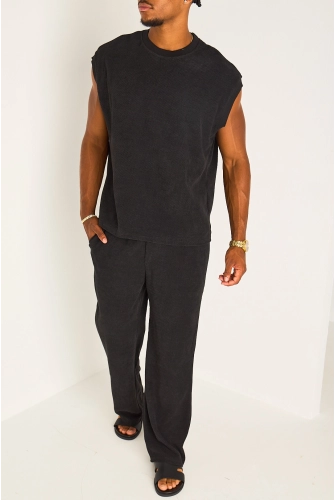 Ensemble deux pièces noir haut sans manches + pantalon effet maille