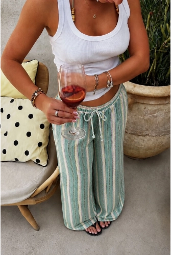 Pantalon fluide vert à rayures multicolore