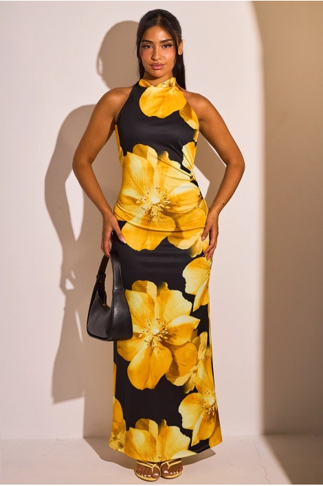 Robe longue noire à motifs floraux jaunes