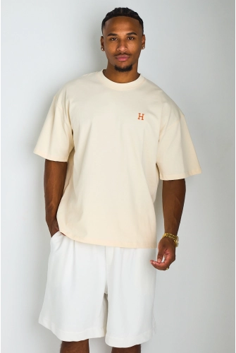 T-shirt beige à broderie '' H "