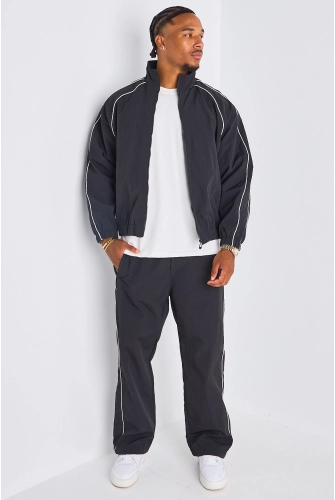 Ensemble survêtement deux pièces noir à bandes blanches veste + jogging
