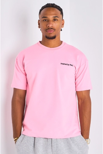 T-shirt rose à imprimé et inscription "inspired by paris "