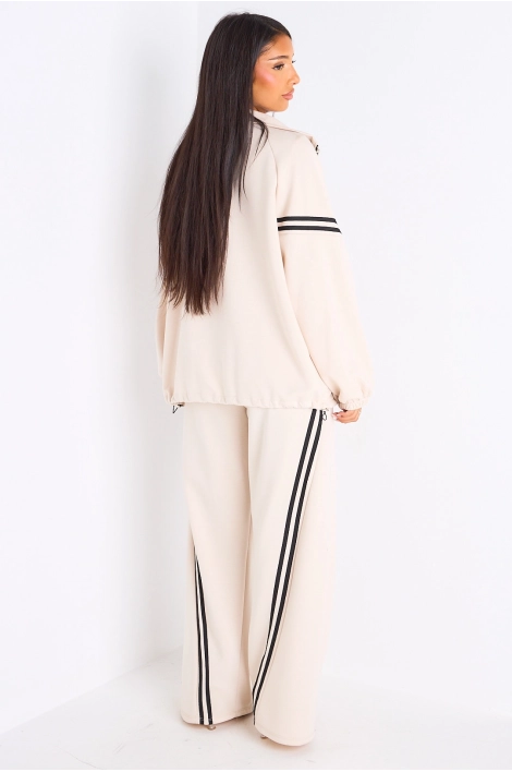 Ensemble de sport beige à liseré noir
