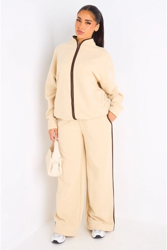 Ensemble deux pièces beige à bandes blanches veste + jogging coupe droite