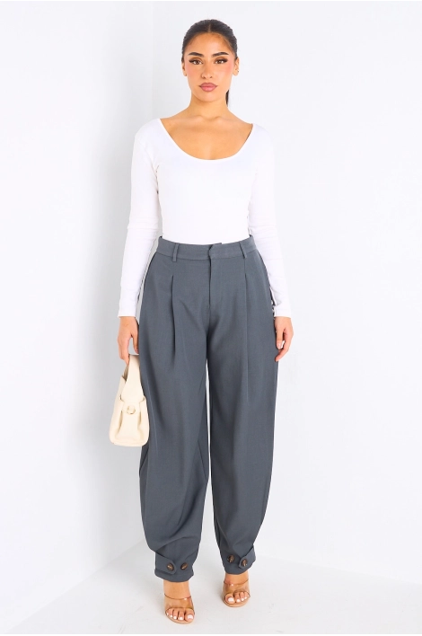 Pantalon gris à bas de jambes ajustables