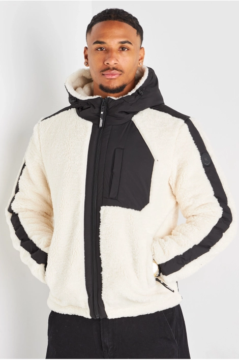 Veste noire à capuche et empiècement peau de mouton blanc