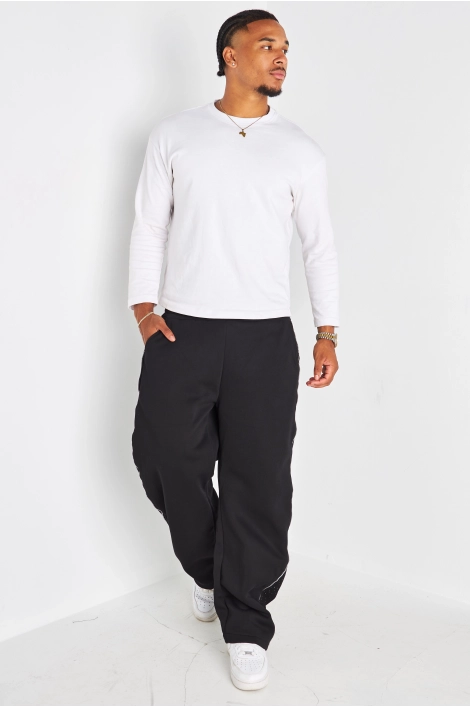 Jogging noir à empiècements strass et zip