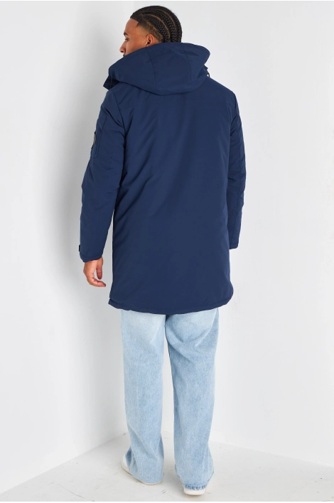Doudoune bleu marine à capuche et doublure peau de mouton