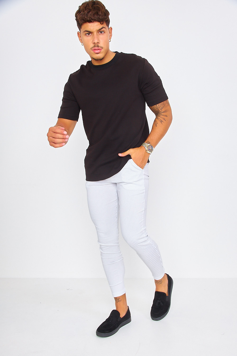 Pantalon chino blanc à rayures pointillées noires