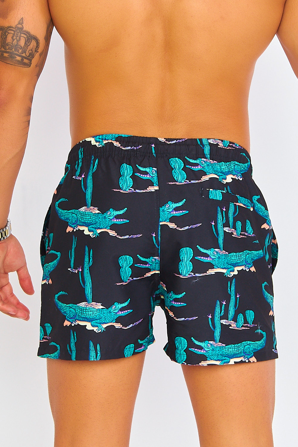 Short de bain noir à motif crocodiles verts