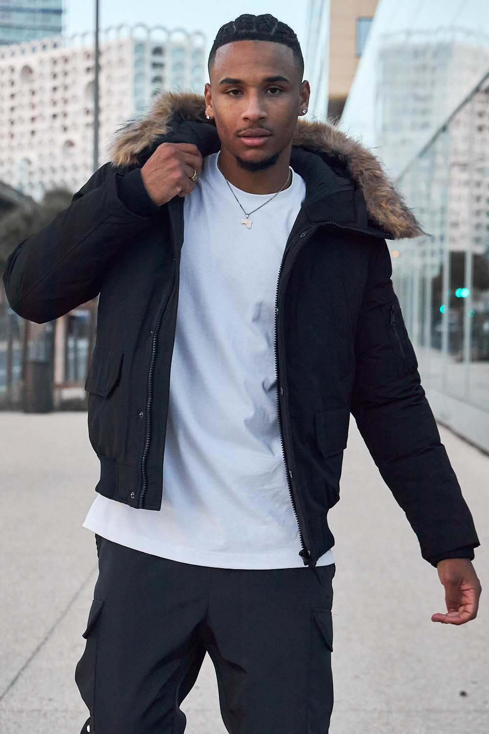 Parka bi-matière noire à capuche en fourrure