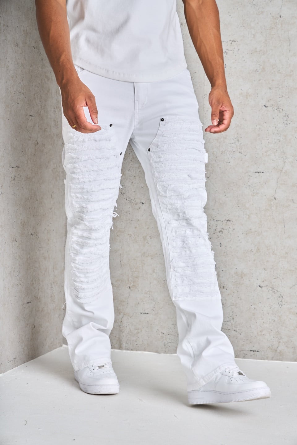 Jean blanc déchiré