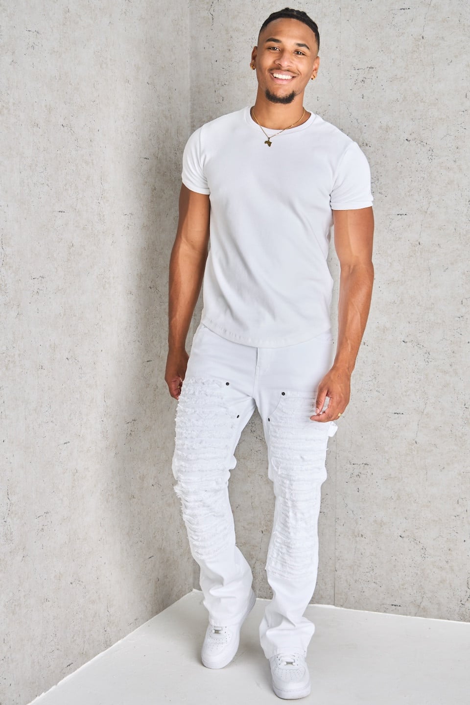 Jean blanc déchiré