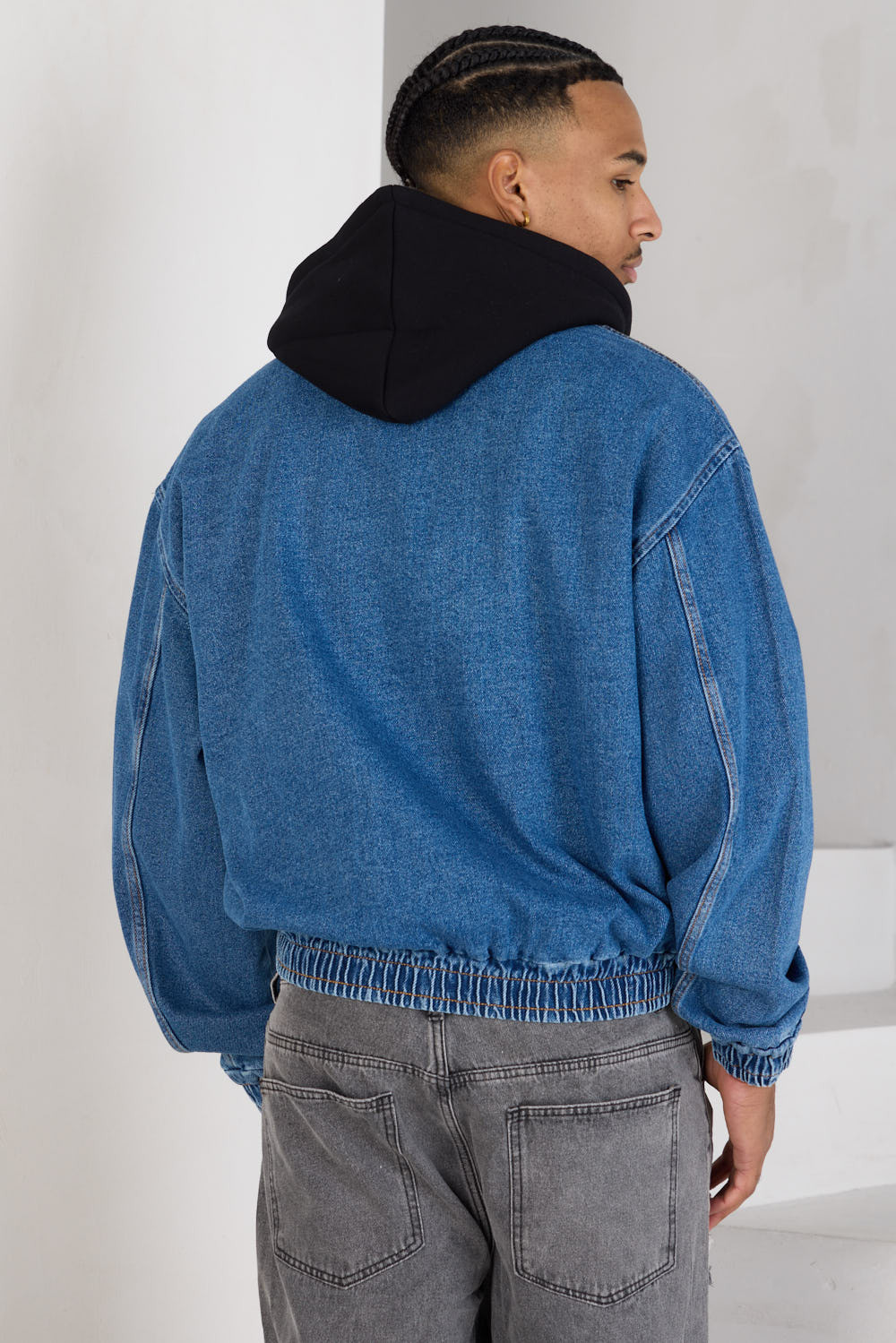 Veste en jean bleu à capuche bi-matière