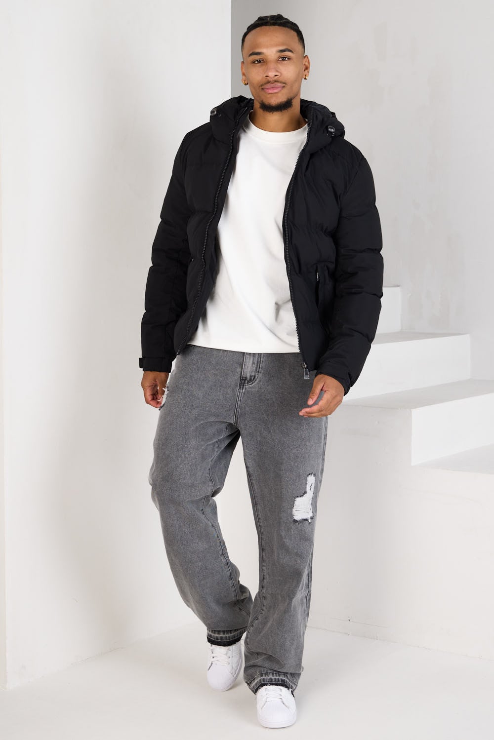 Doudoune noire matelassée à capuche