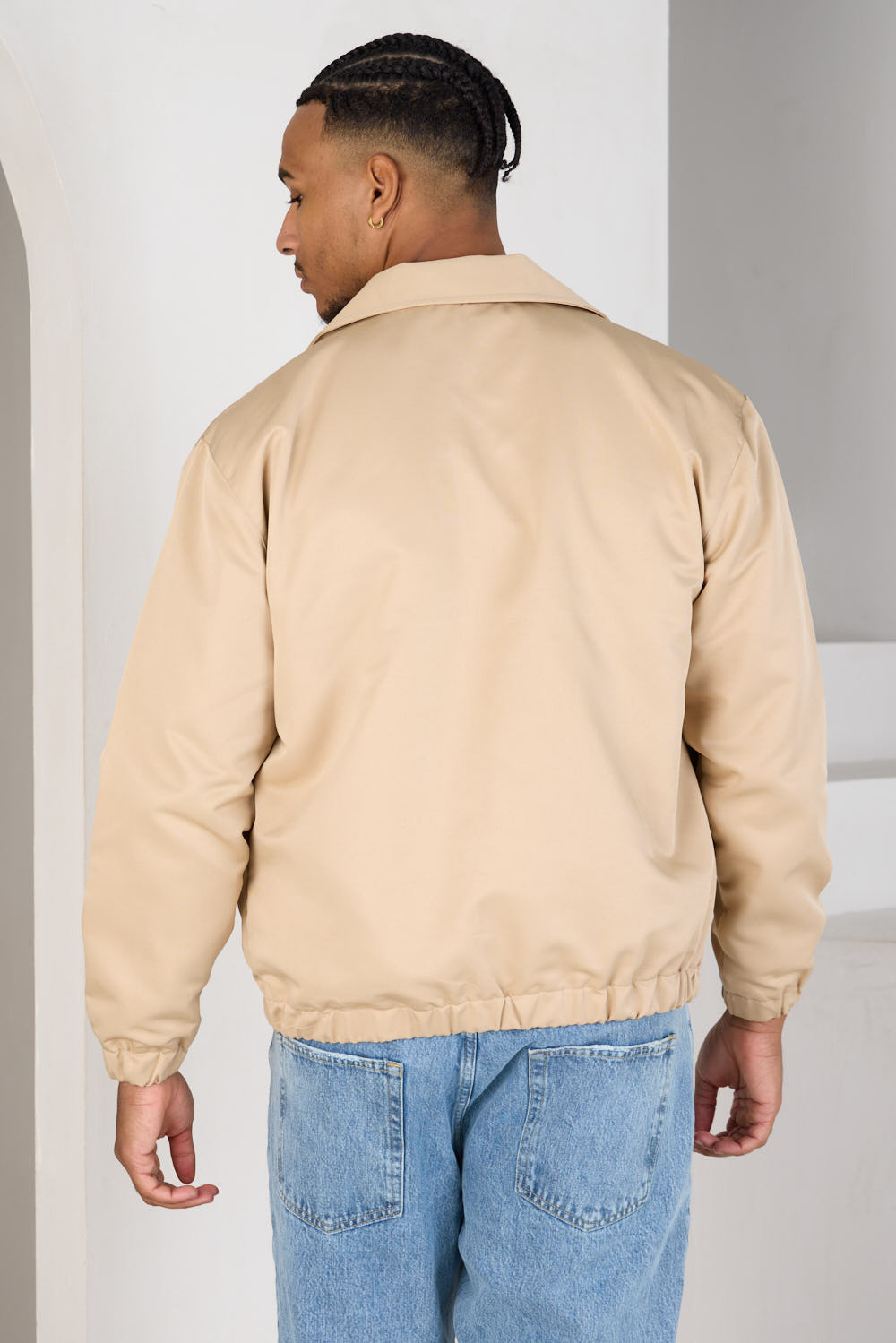 Veste beige foncé zippée à cœur sur la poitrine