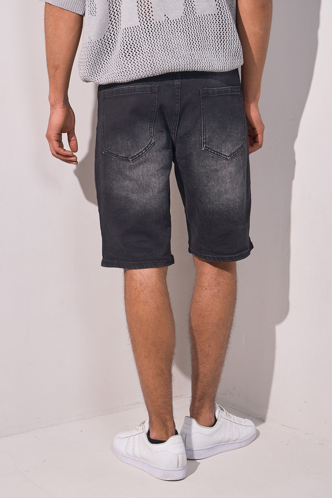 Short en jean noir déchiré