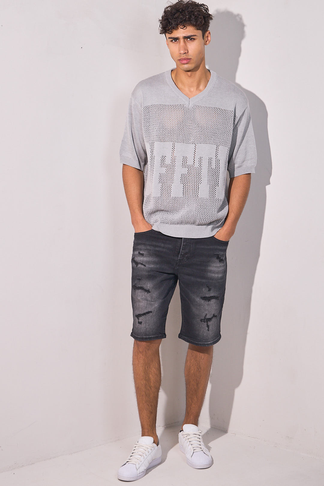 Short en jean noir déchiré
