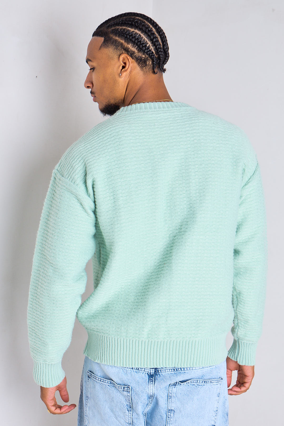 Pull vert clair en maille texturée