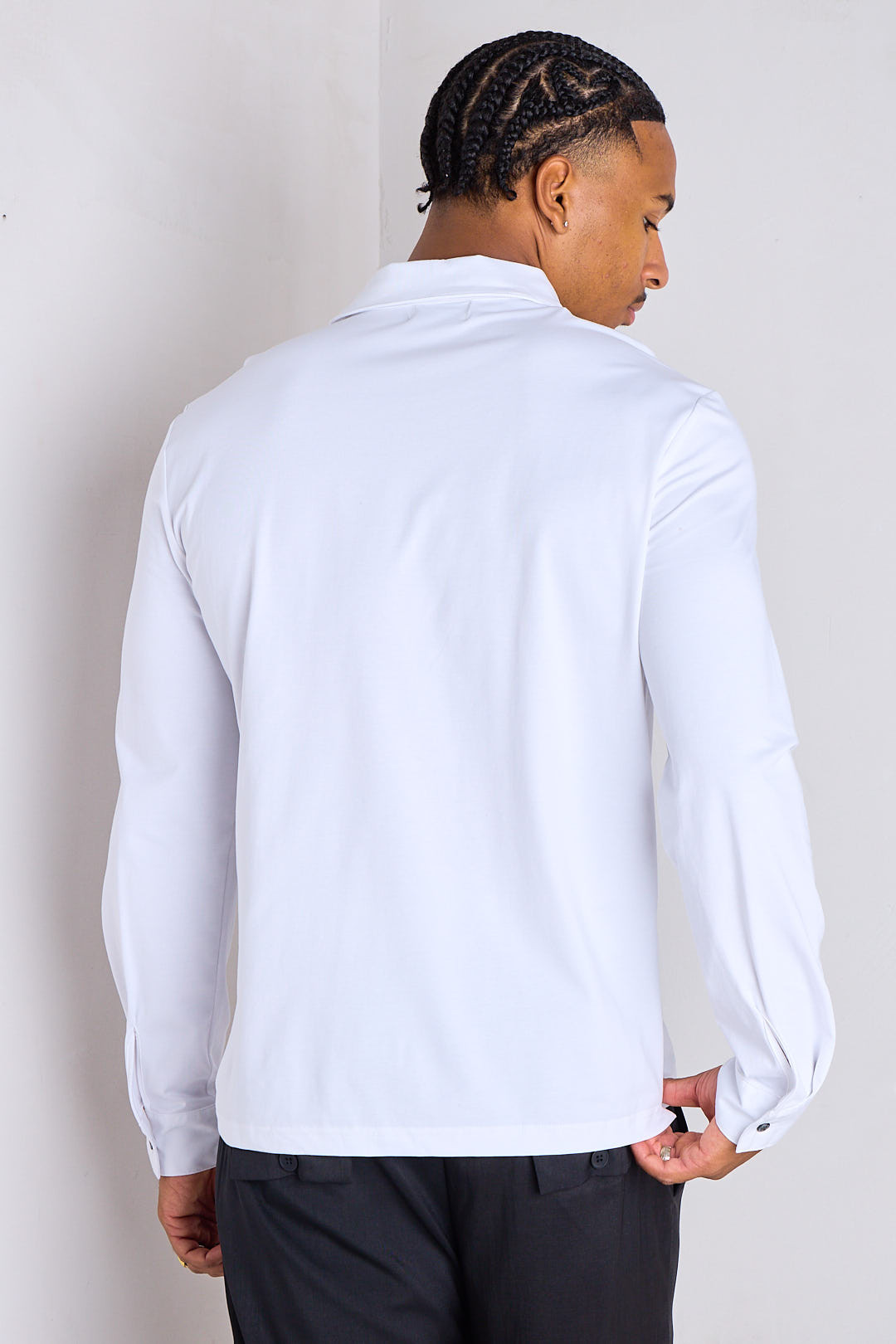 Polo blanc fluide à manches longues