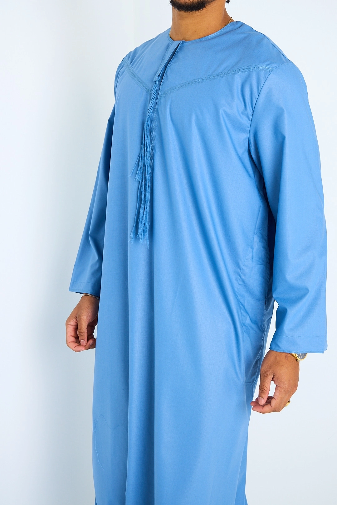 Qamis bleu à pompons