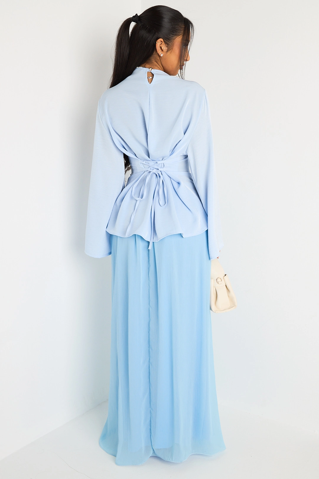 Ensemble deux pièces bleu clair haut cintré + jupe