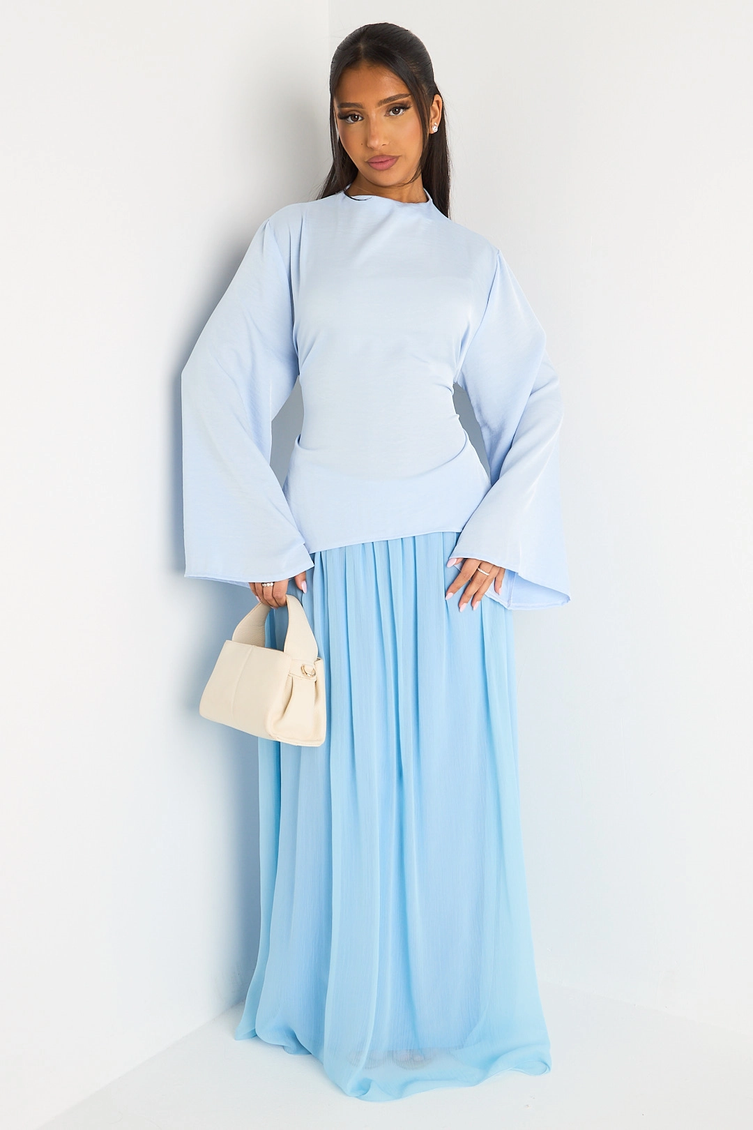 Ensemble deux pièces bleu clair haut cintré + jupe