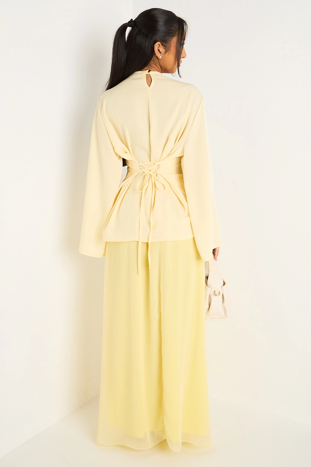 Ensemble deux pièces jaune haut cintré + jupe