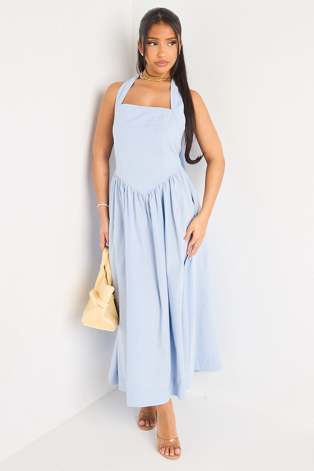 Robe longue bleue à dos nu