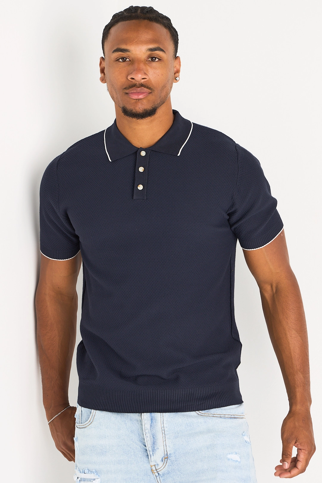 Polo manches courtes bleu foncé à bandes blanches