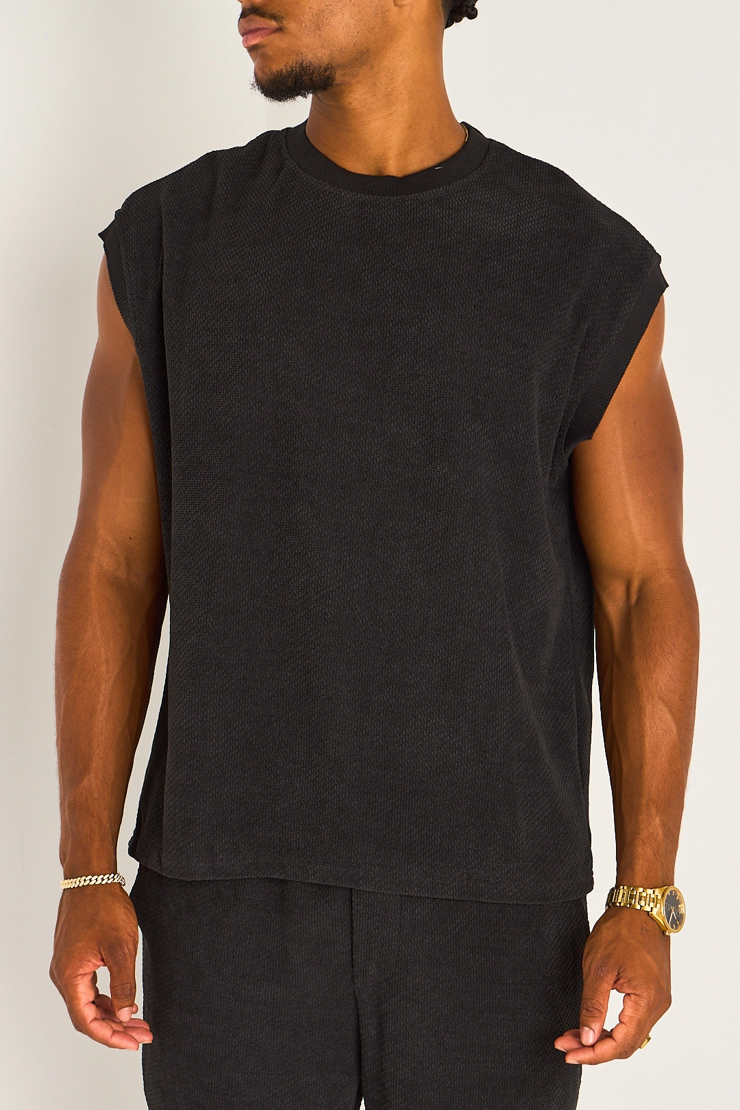 Ensemble deux pièces noir haut sans manches + pantalon effet maille