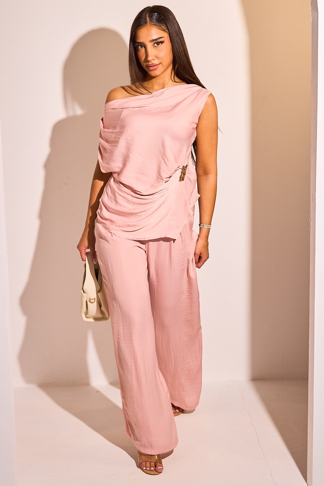 Ensemble deux pièces rose haut sans manches + pantalon