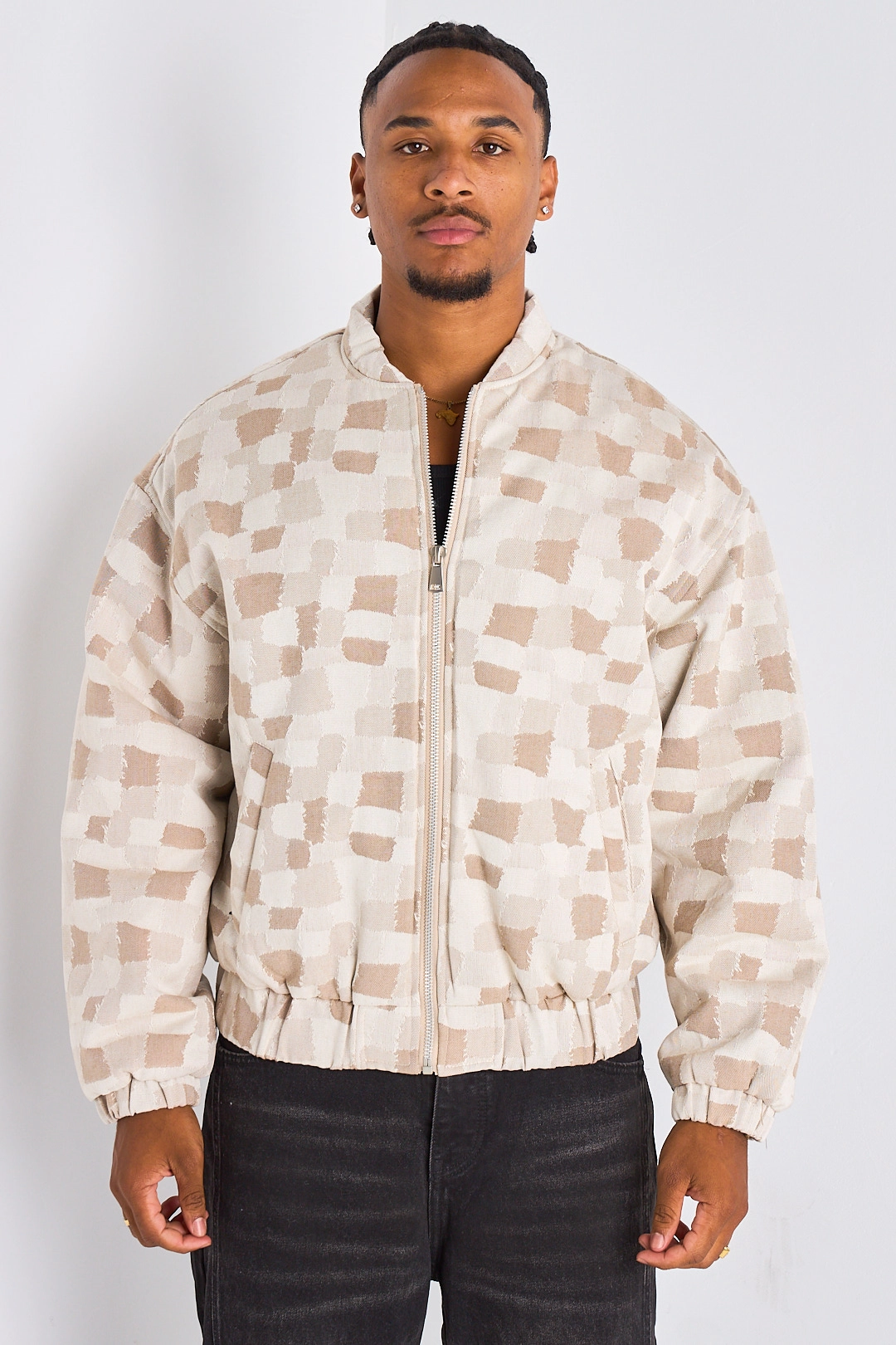 Veste beige style bomber à motifs géométriques carrés
