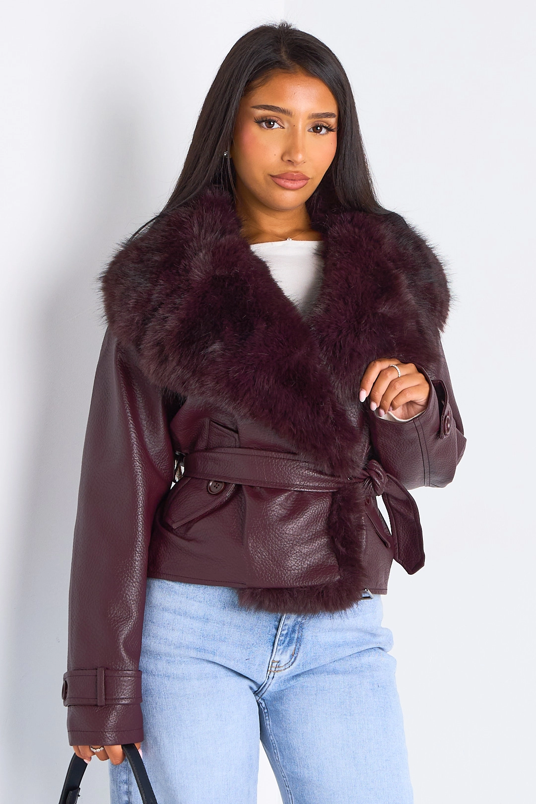 Veste mi-longue en simili cuir à col en fourrure de couleur prune