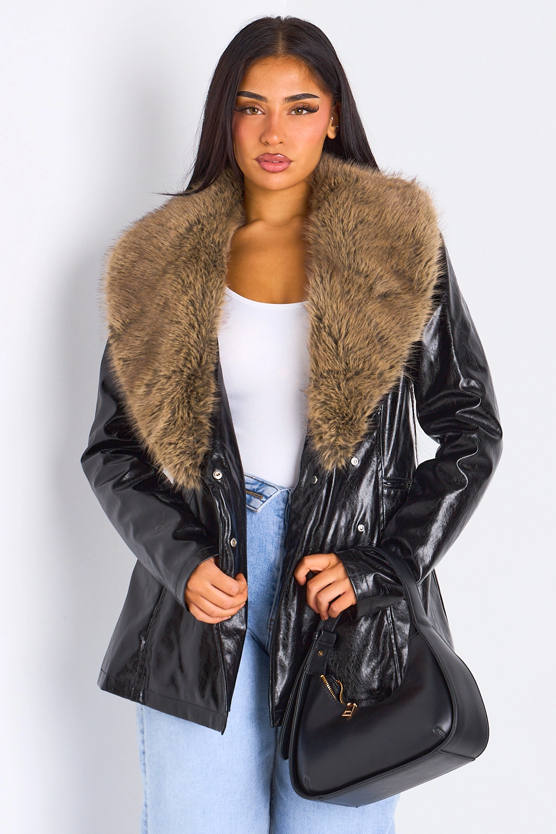 Veste simili cuir noire à empiècement fourrure