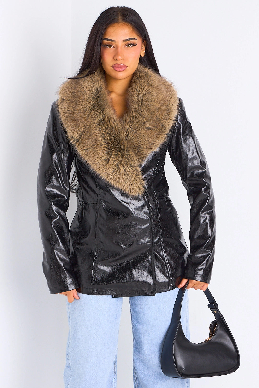 Veste simili cuir noire à empiècement fourrure