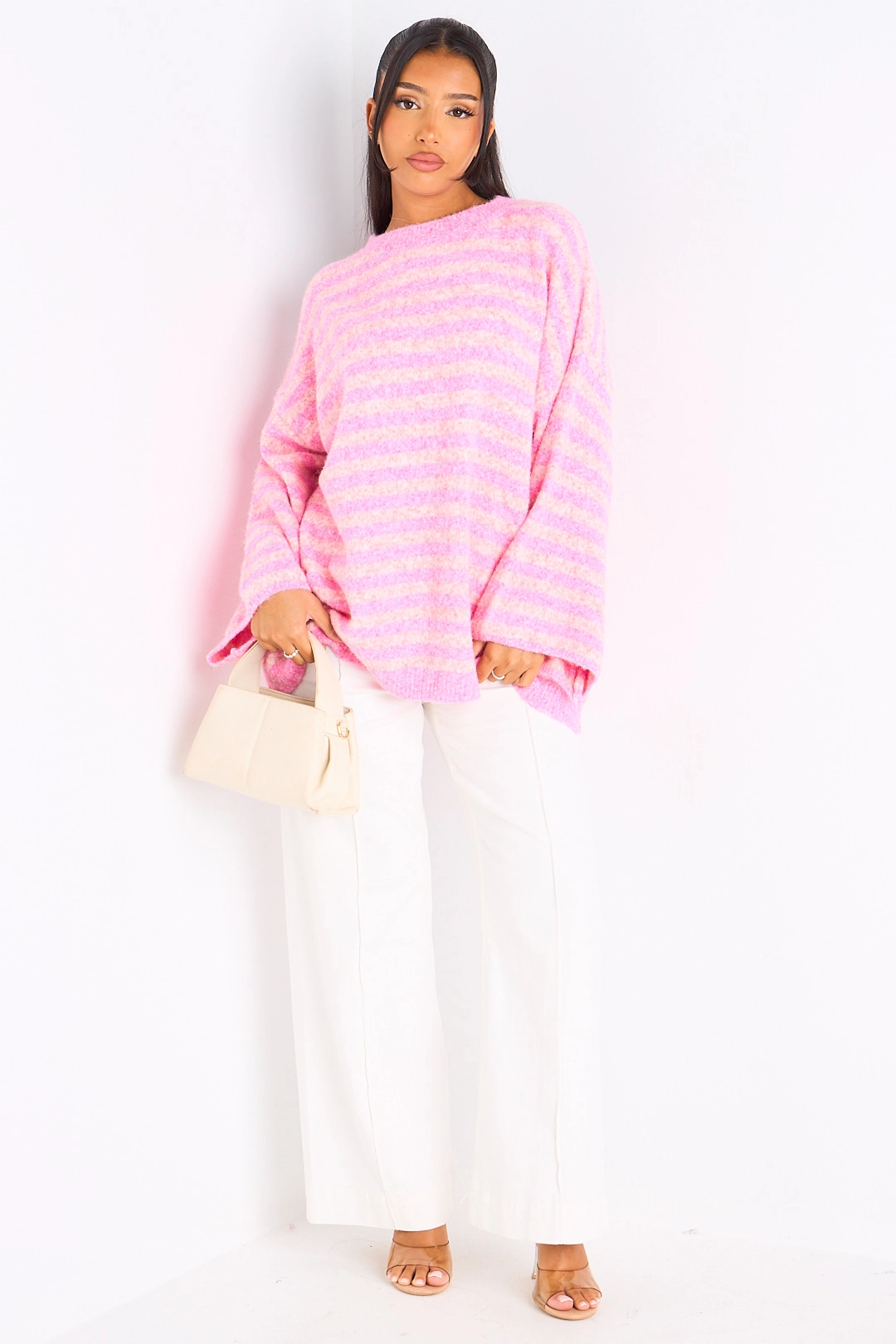 Pull en laine rose à rayures rose clair